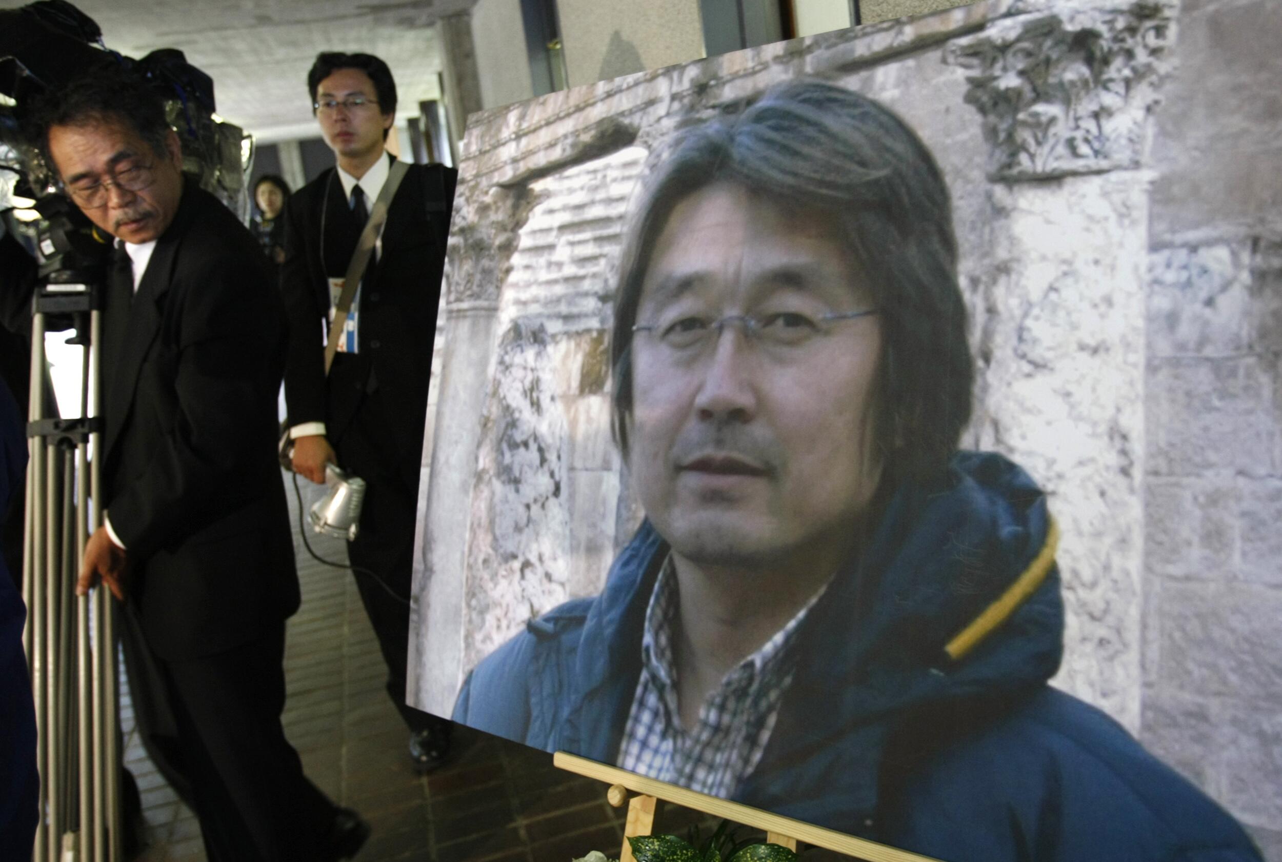 Profesionalas: šioje nuotraukoje įamžintas japonų fotografas Kenji Nagai, žuvęs Mianmare per 2007 m. vasaros neramumus. Jis buvo žurnalistas, savo gyvybe rizikavęs dėl profesijos.
