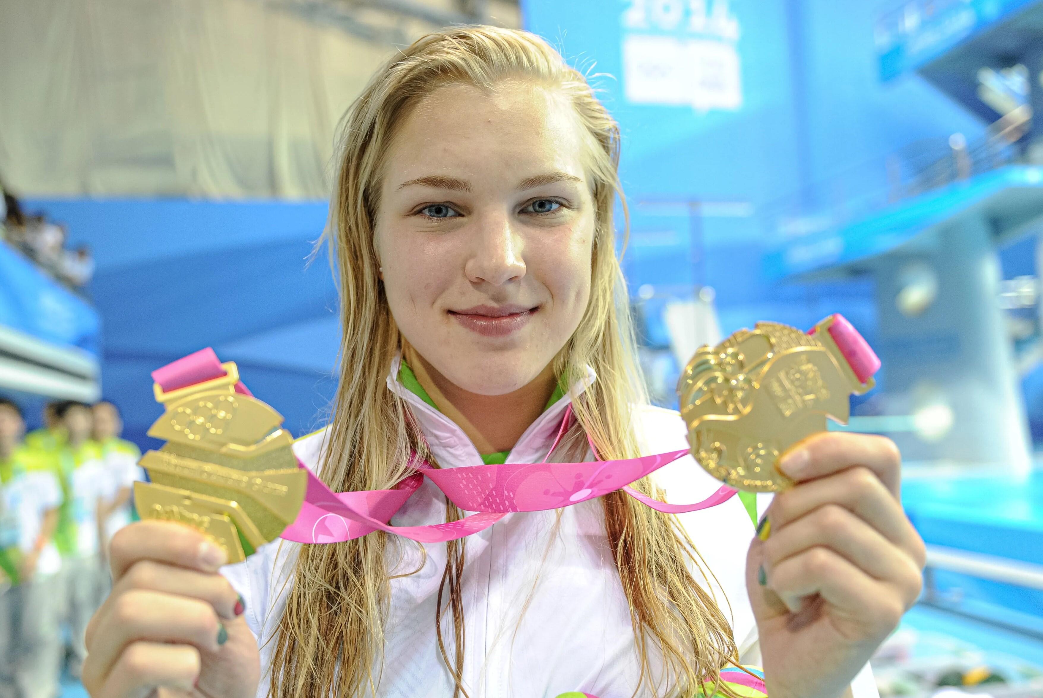 Istorija: 2010-ieji, R. Meilutytės rankose – du Nandzingo žaidynių aukso medaliai.