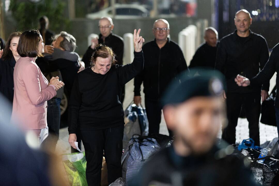 Iš Baltarusijos nelaisvės išvaduoti žmonės prie JAV ambasados Vilniuje