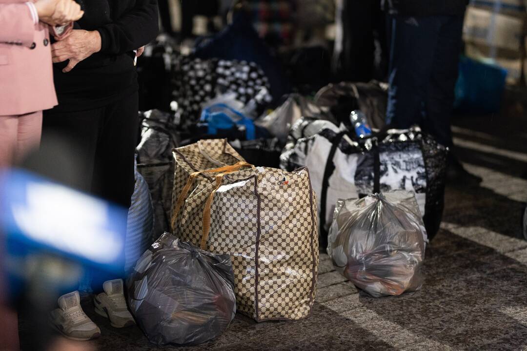 Iš Baltarusijos nelaisvės išvaduoti žmonės prie JAV ambasados Vilniuje