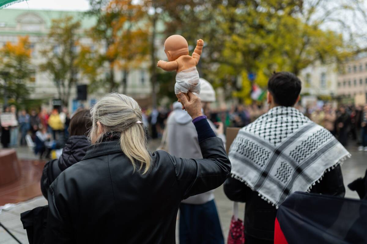 Vilniuje vyko protestas „2 metai genocido: užtenka tylėti!“
