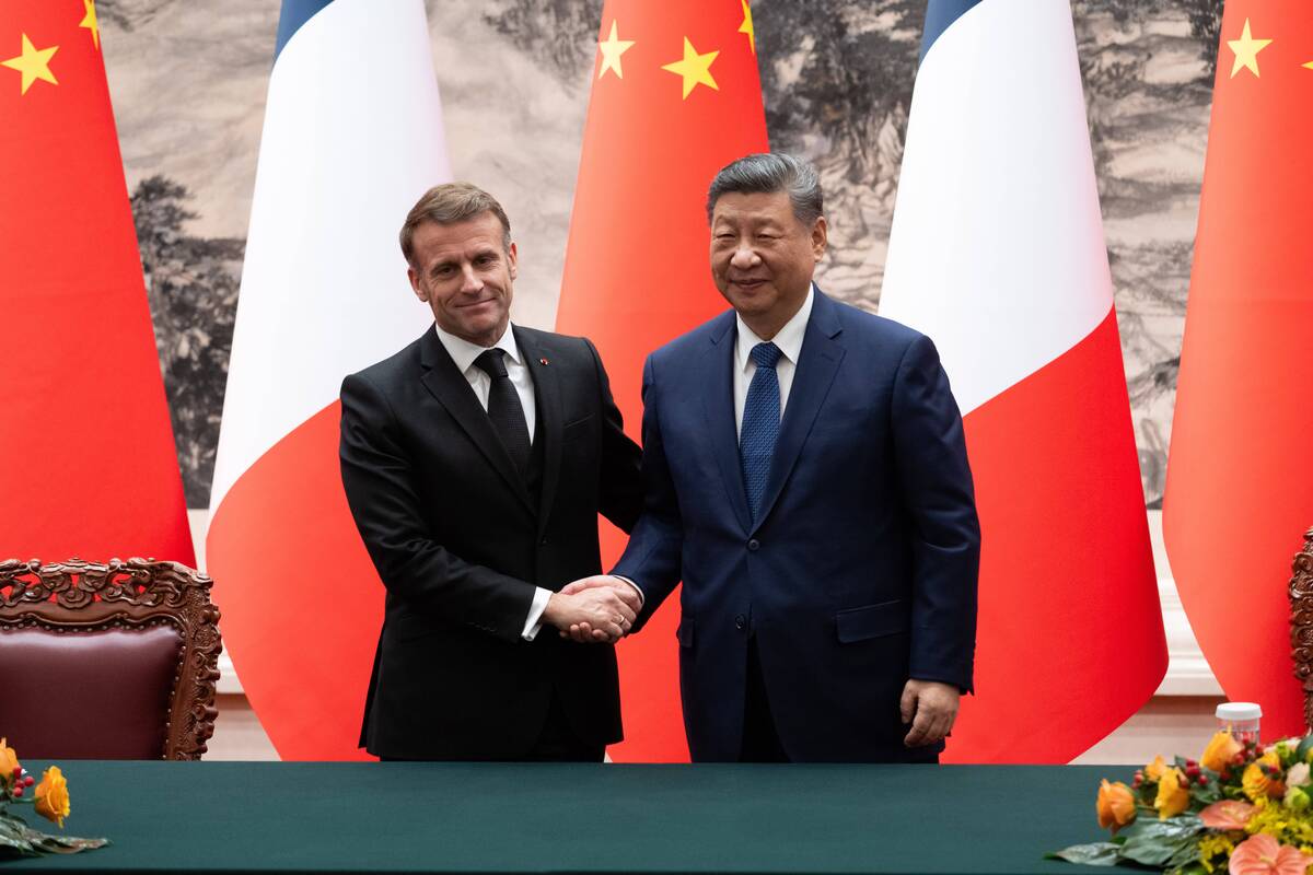 Macroną Pekine priėmęs Xi ragina palaikyti stabilesnius tarpusavio santykius