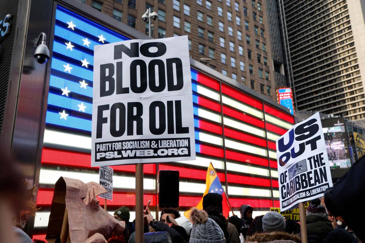 Pasirinkęs nuversti režimą Venesueloje Trumpas rizikuoja įsiutinti savo rinkėjus