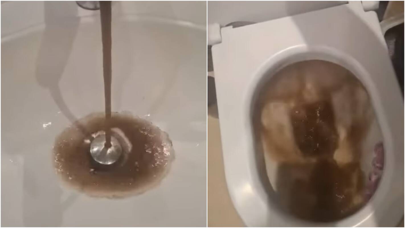 Vandentiekio avarija: užlieta gatvė ir iš čiaupų bėgantis juodas vanduo