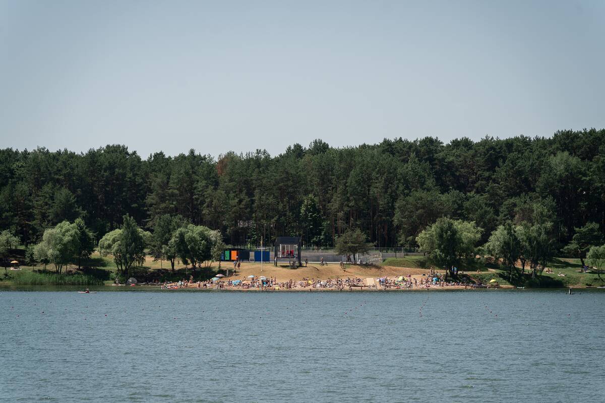 Karštis ištuštino gatves, bet užpildė Kauno paplūdimius