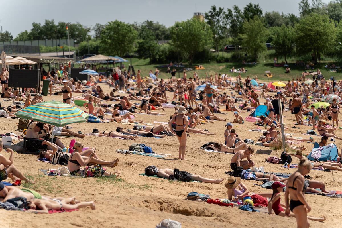 Karštis ištuštino gatves, bet užpildė Kauno paplūdimius