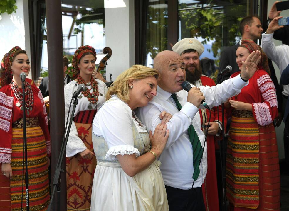 Karina Kneissl ir Vladimiras Putinas