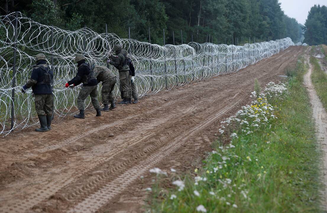 Minskas: per du mėnesius Lietuva ir Lenkija bandė išstumti per 8,5 tūkst. migrantų 