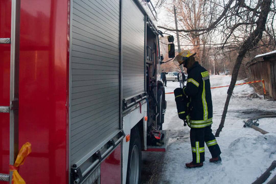 Vilniaus centre degė namas, ugniagesiai išgelbėjo 11 žmonių