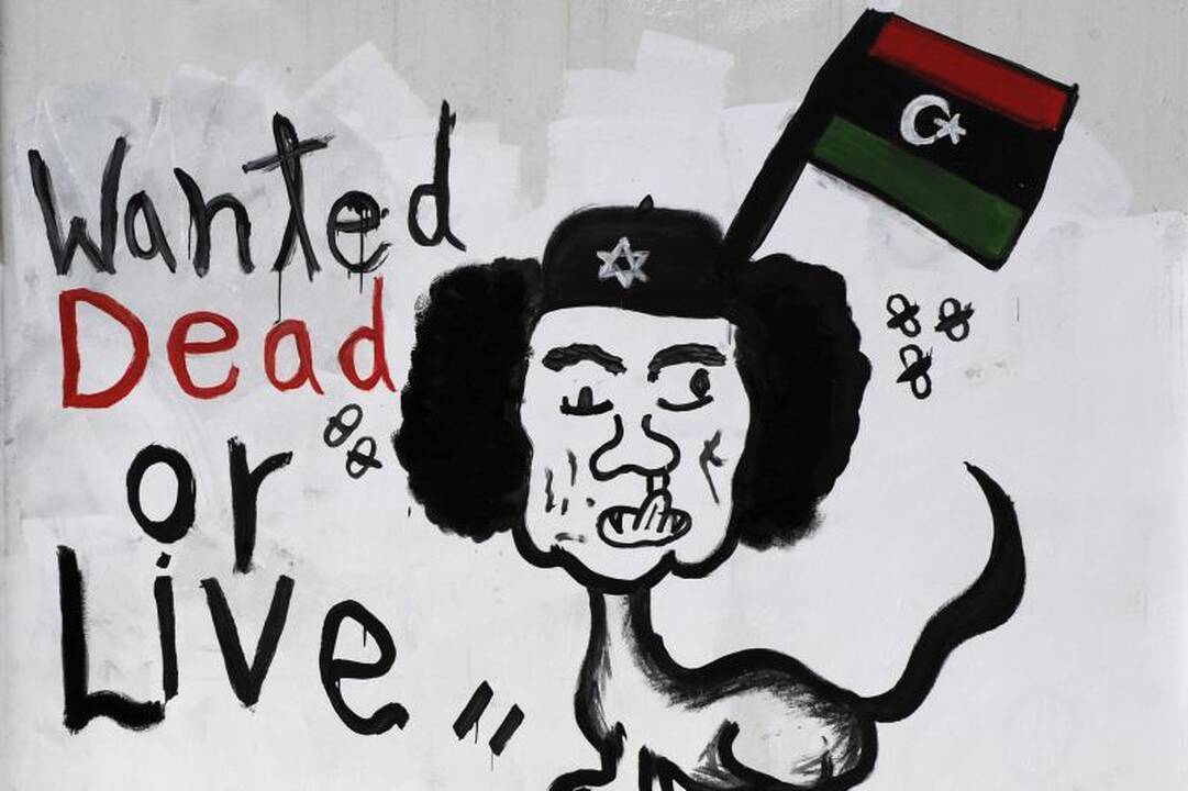 Sirijos TV: M.Kadhafi tebėra savo šalyje