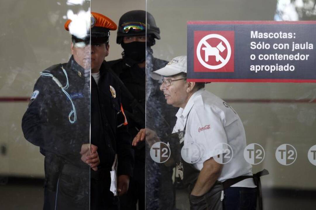 Meksiko oro uoste nušauti trys policininkai