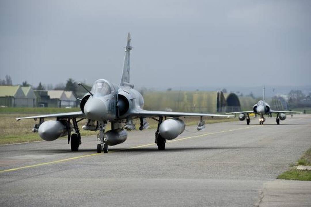JAV ir britų laivai paleido bent 110 raketų į taikinius Libijoje, M.Kadhafi grasina kerštu