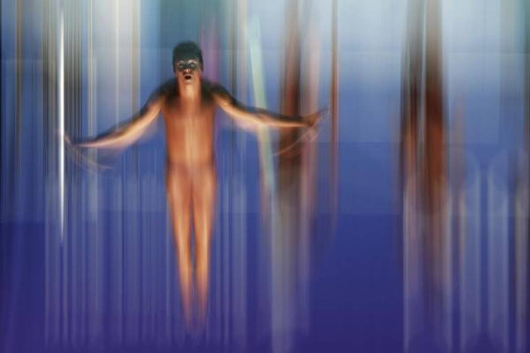 "World Press Photo" konkursą laimėjo nuo vyro smurto nukentėjusią afganę vaizduojanti nuotrauka