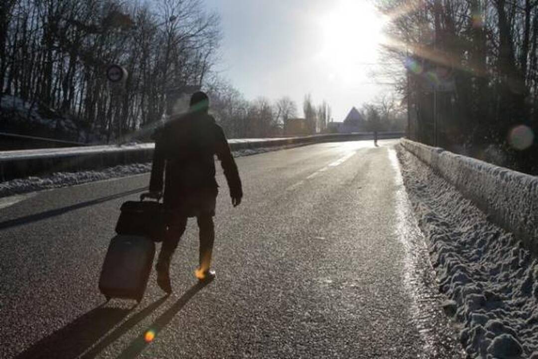 Apsnigtą Paryžių sukaustė ledas