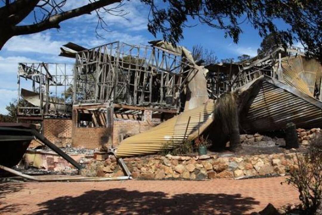 Australijos policininkas kaltinamas sukėlęs 72 namus sunaikinusį gaisrą