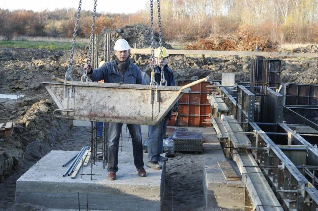 Dvasinės paramos centro pamatus sutvirtino atminimo simboliais  