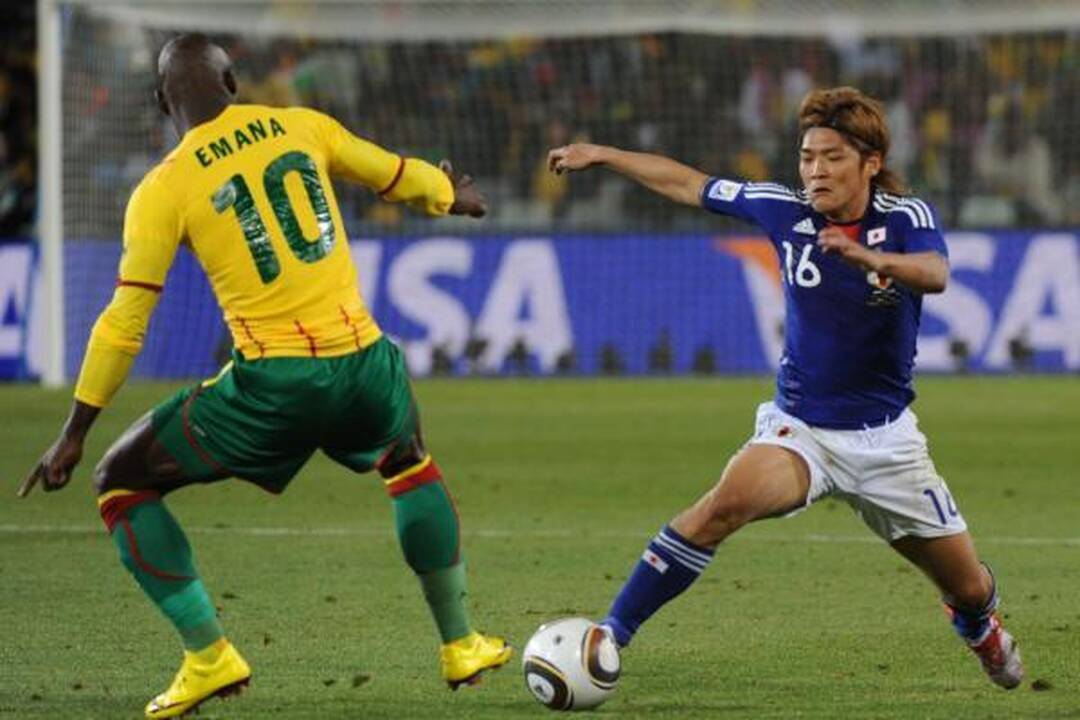 E grupė: japonų spyris Kamerūno futbolininkams 