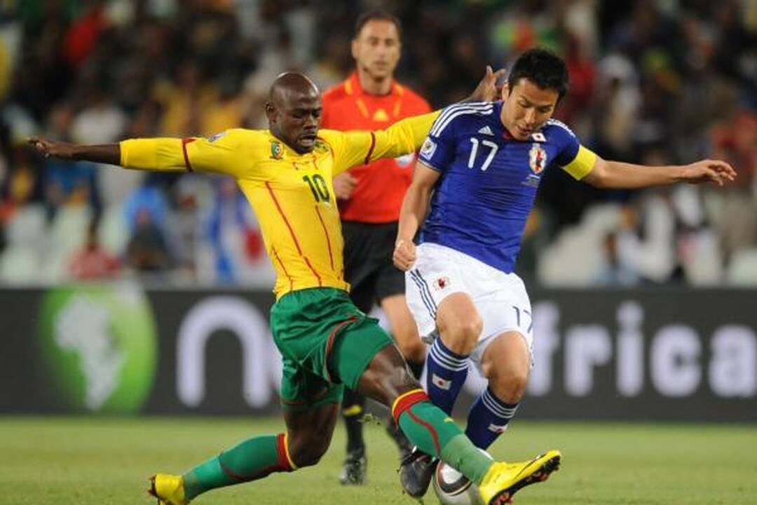 E grupė: japonų spyris Kamerūno futbolininkams 