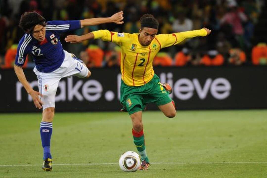 E grupė: japonų spyris Kamerūno futbolininkams 