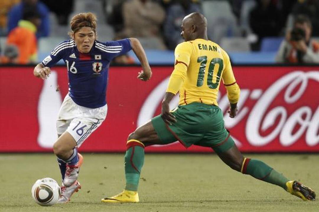 E grupė: japonų spyris Kamerūno futbolininkams 