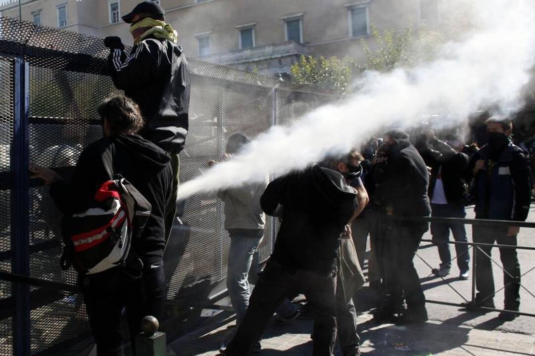 Žiaurų protestą Graikijoje lydi grasinimai