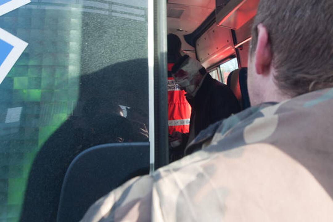 Vilniuje skubėdamas į gaisrą į avariją pateko policijos ekipažas (papildyta)