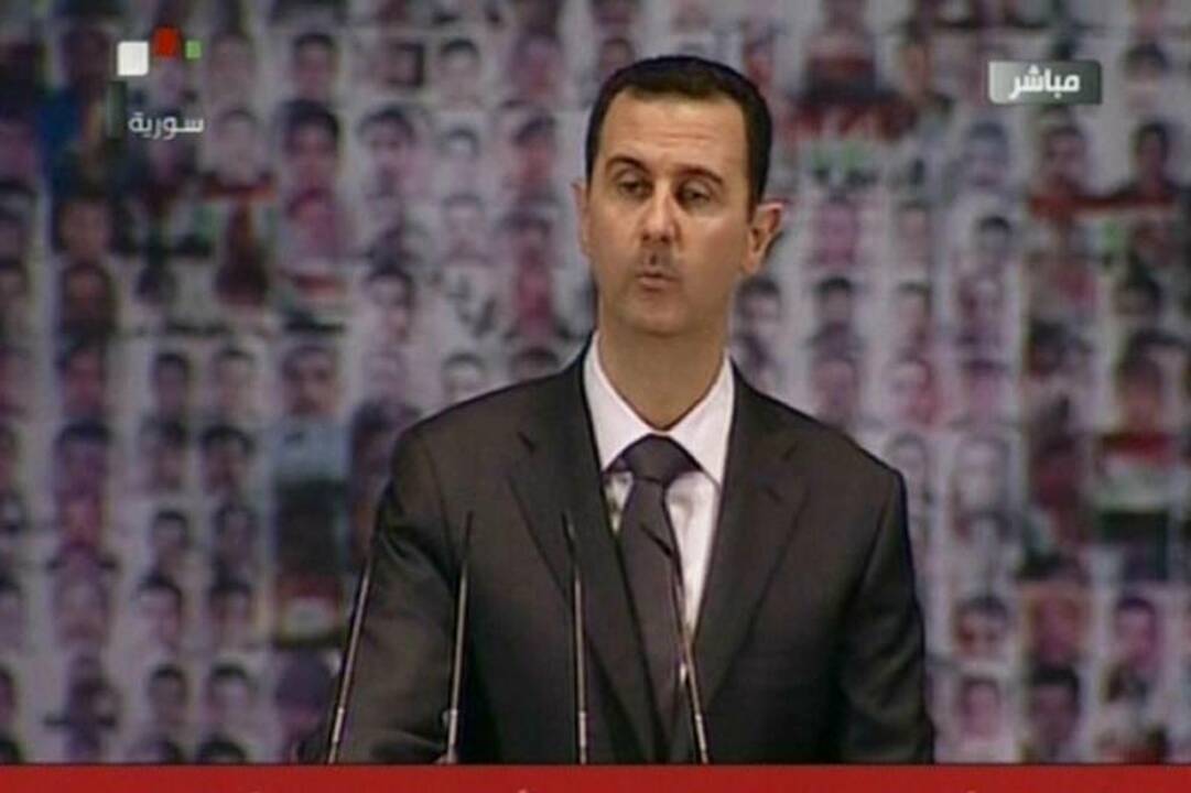 al Assadas savo tiesas įrodinės TV eteryje.