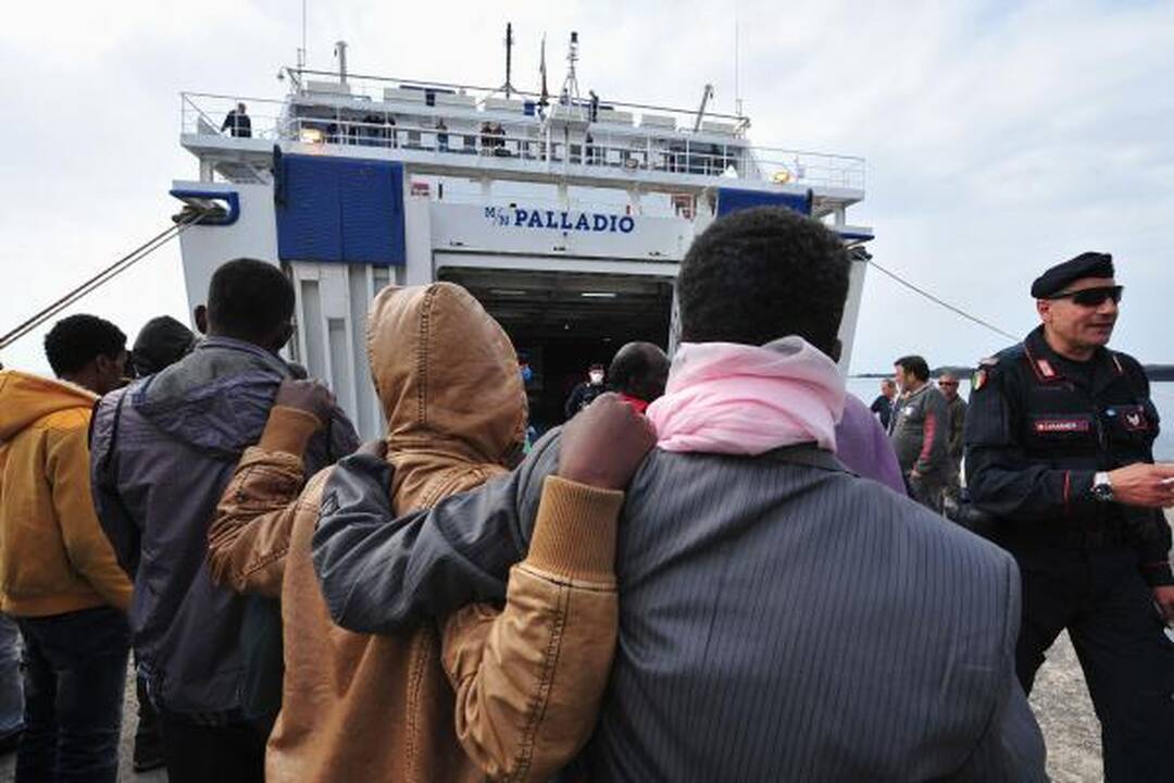 Italijos salas pasiekė apie tūkstantį pabėgėlių iš Libijos ir Tuniso
