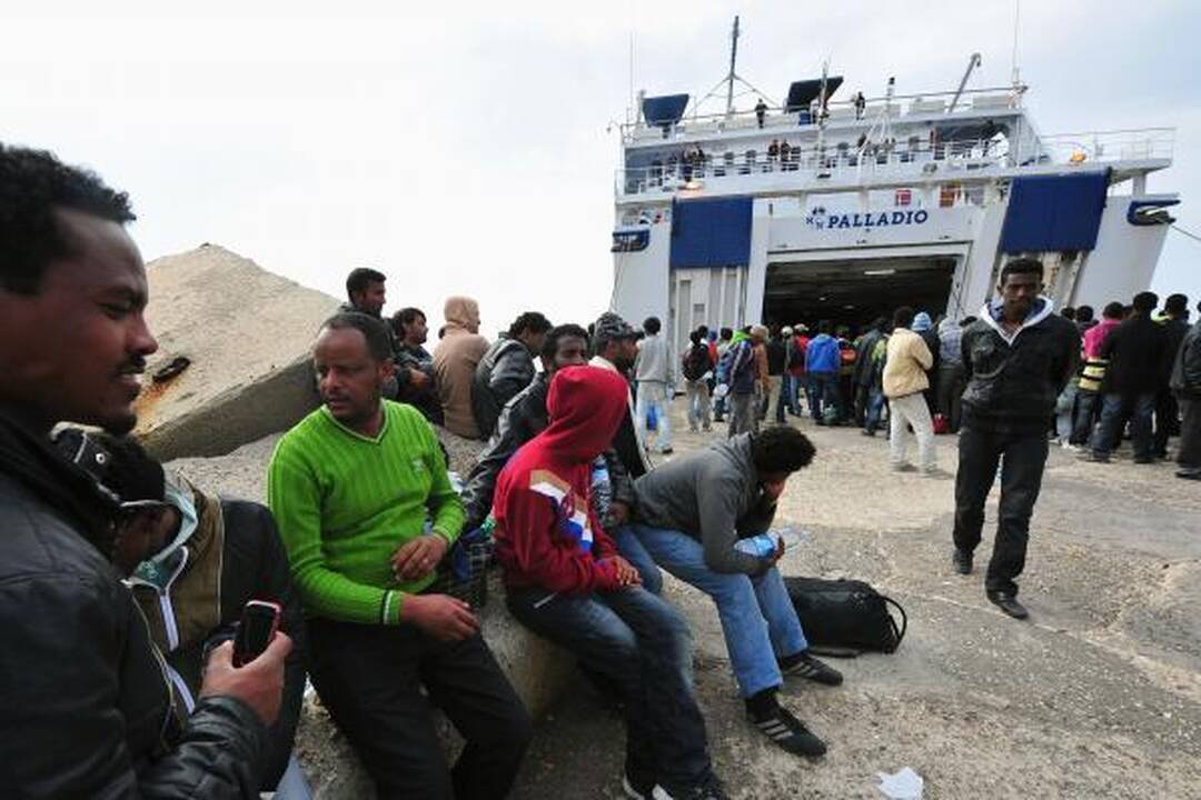 Italijos salas pasiekė apie tūkstantį pabėgėlių iš Libijos ir Tuniso