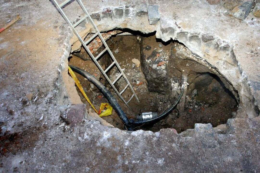 Kodėl einant Vilniaus gatve verta žiūrėti po kojomis?