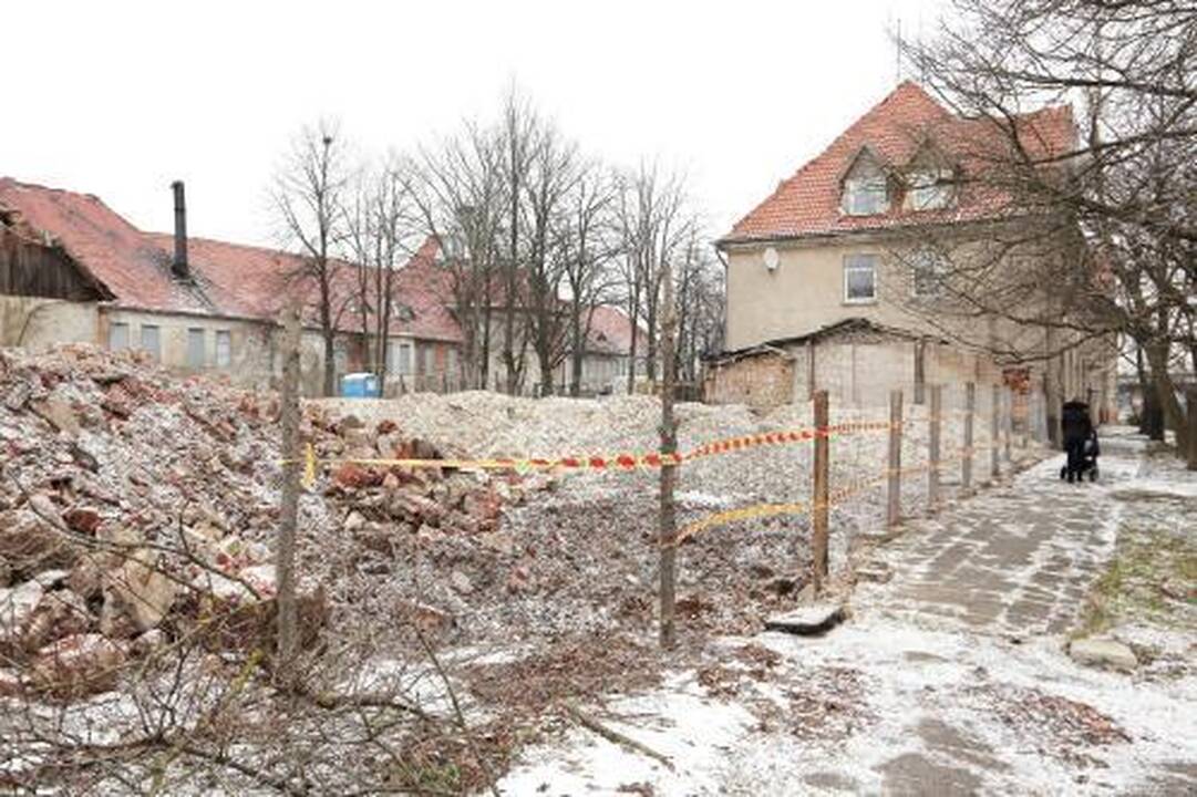 Į miesto centrą grįžta statybininkai