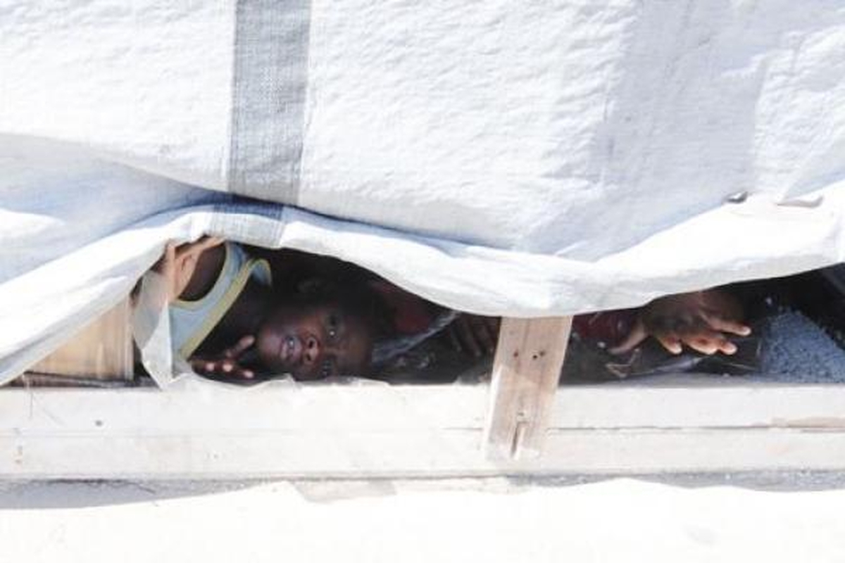 Choleros gniaužtuose atsidūrusius haitiečius kausto baimė ir kančia