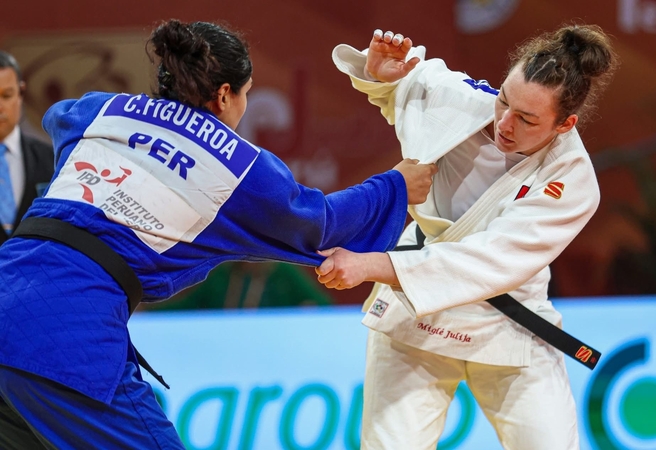 Sėkmė: M. J. Dudėnaitė „Grand Prix“ turnyre Limoje nugalėjo šeimininkų atstovę C. Figueroą.