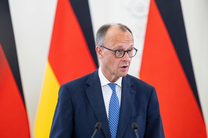 Friedrichas Merzas: smurto lygis JAV kelia itin didelį nerimą