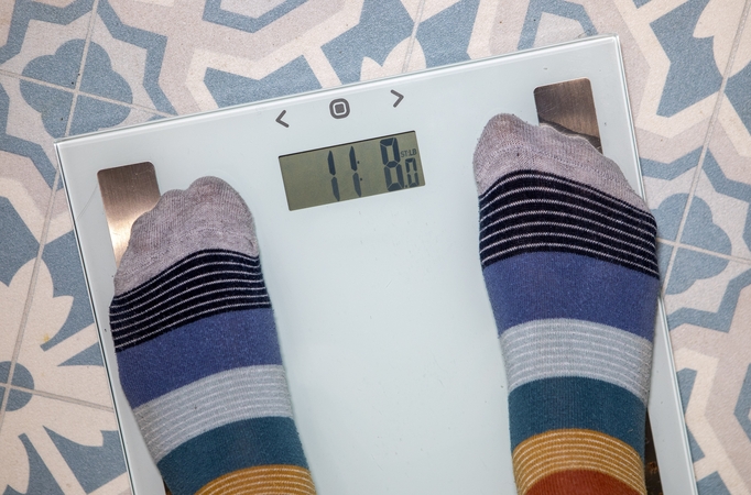 Po pažado mirštančiam tėvui moteris atsikratė 90 kilogramų