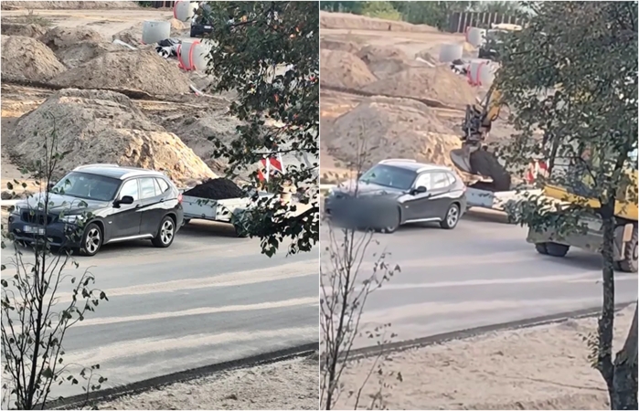 Suglumino vaizdas: statybvietėje į BMW priekabą krovė žemes