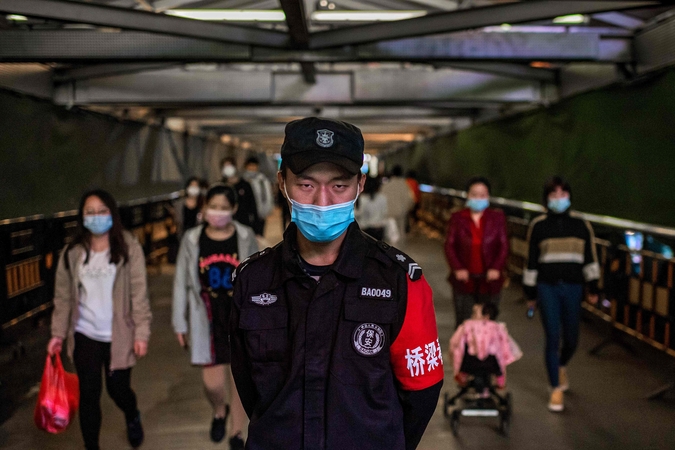 Po ilgos pertraukos Kinija vėl imasi masinio COVID-19 testavimo