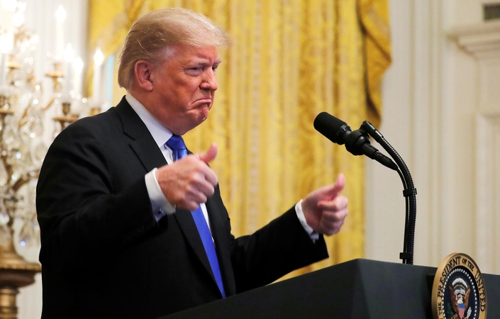 D. Trumpas sako netikintis savo paties vyriausybės perspėjimu dėl klimato