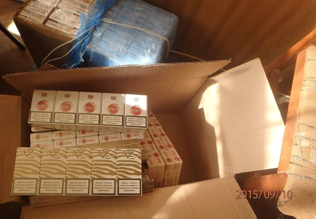 Jonaviškio garaže aptikta kontrabandinių cigarečių