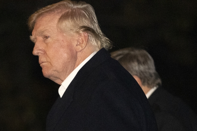 Trumpas atrėžė į kritiką dėl vis glaudesnių santykių su Putinu  