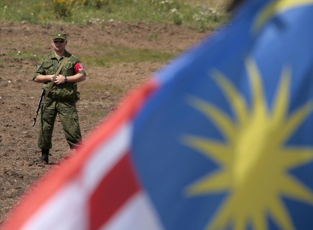 Ragina griežtai laikytis paliaubų Ukrainoje