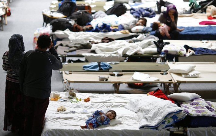 Toliau plūstant migrantams, Vokietija sugriežtino taisykles