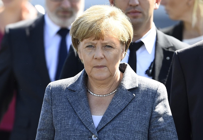 Į pabėgėlių stovyklą atvykusi A. Merkel išvadinta išdavike