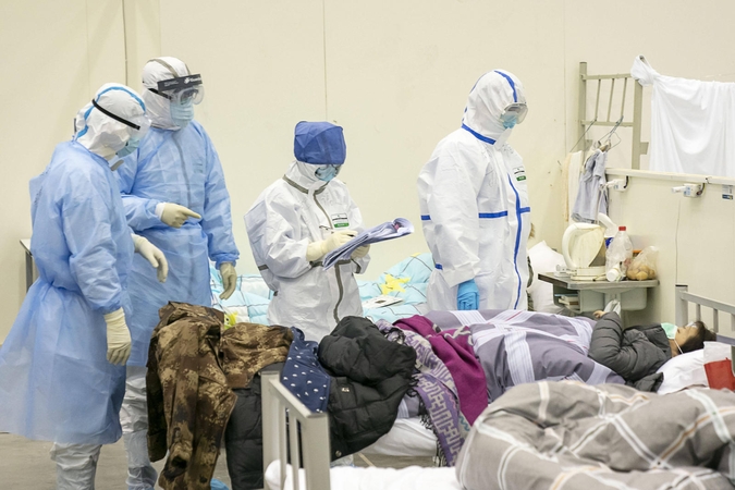 Į Kiniją atvykusi PSO ekspertų komanda padės tirti koronaviruso protrūkį