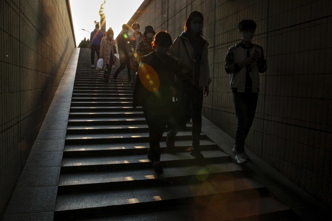 Dingo trys Pekino aktyvistai, internete archyvavę straipsnius apie koronavirusą