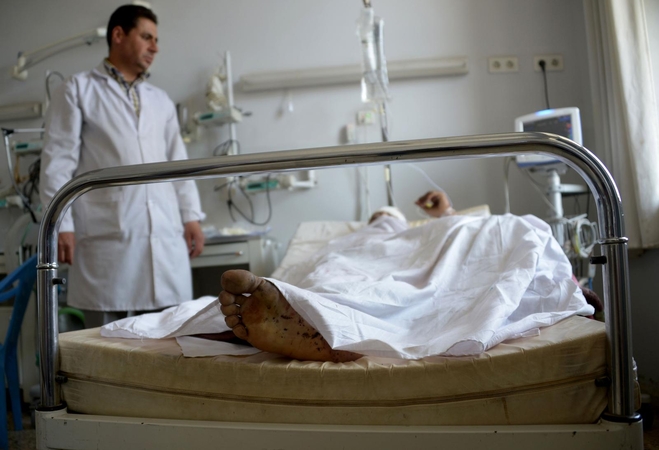 Talibanui užpuolus armijos bazę žuvo ar sužeista per 100 karių