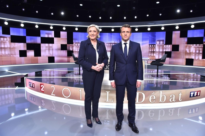 E. Macronas ir M. Le Pen susirungė aršiuose televizijos debatuose