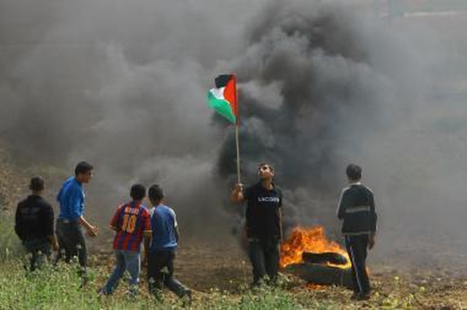 M.Abbasas: palestiniečiai "užverčia tamsų priešpriešos puslapį"