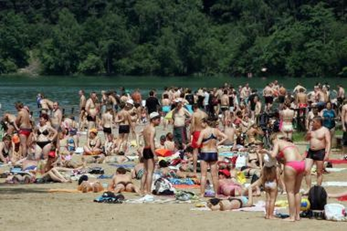 Po liūčių vilniečiams nepatariama maudytis Neries paplūdimiuose