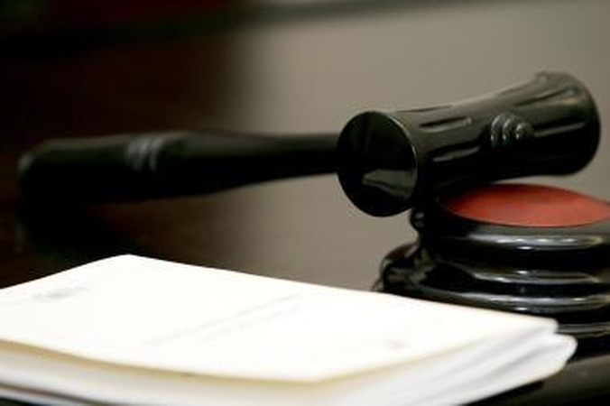 Kinija: dėl riaušių - 6 mirties nuosprendžiai